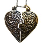 Tristan and Iseult Love Token Pair Pendant both parts fit together to make a complete heart, they are decorated with celtic knotwork