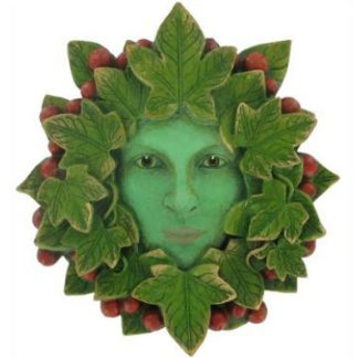 Lady Tendril Green Woman Plaque her face is surrounded by leaves and clusters of berries