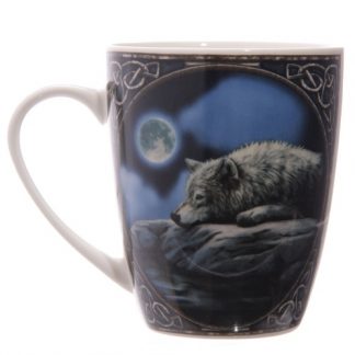 Quiet Reflection Mug shows a wolf resting by the waterside in the light of the full moon